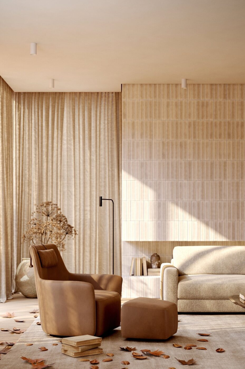 Autumn Ambiance by Domkapa Autumn living room with Alexander Armchair in terracotta tones and leaves on the floor around it. Natural light is illuminating the room.