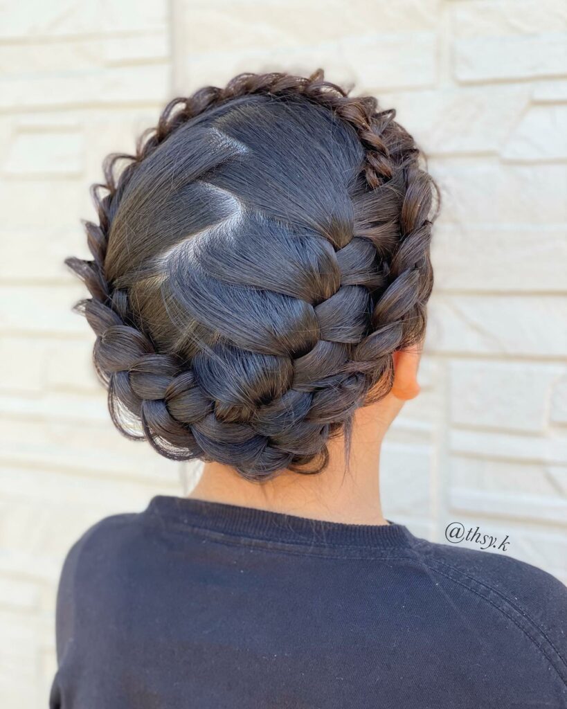 Chignon de laitière avec tresses hollandaises